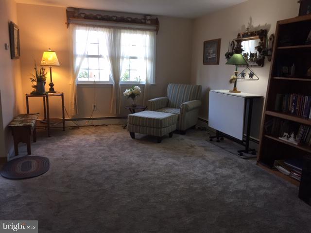 911 Lavera Road Warminster, PA 18974 - Photo 9 of 33 The "L" shaped family room has a place to read.