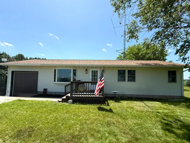 a house view with a garden space