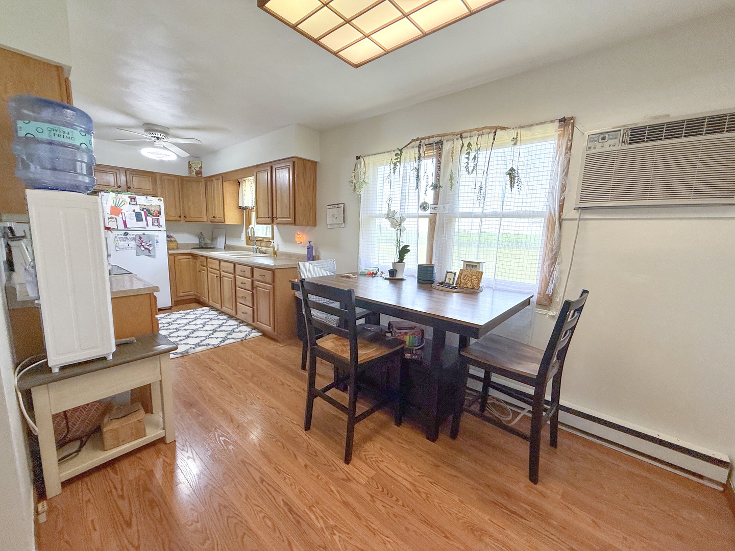 31535 East Thome Road Rock Falls, IL 61071 - Photo 13 of 31 a dining room with furniture and wooden floor