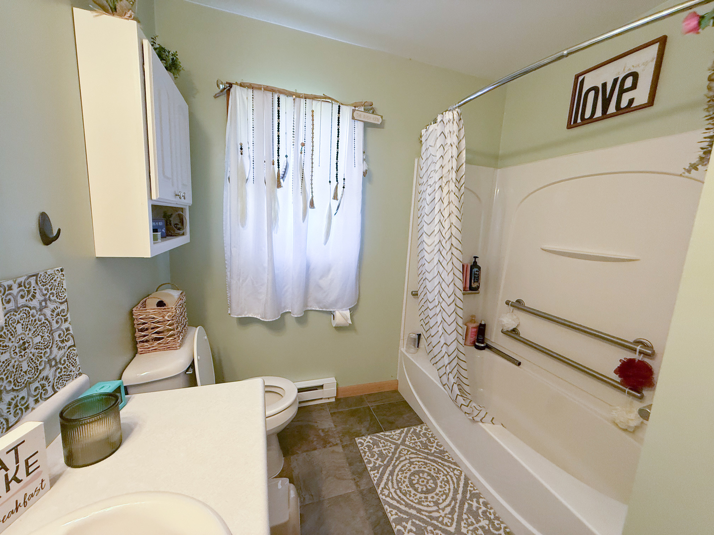 31535 East Thome Road Rock Falls, IL 61071 - Photo 16 of 31 a bathroom with a bathtub and shower
