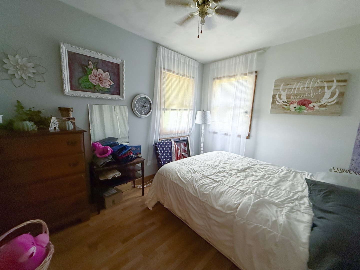31535 East Thome Road Rock Falls, IL 61071 - Photo 20 of 31 a bedroom with a bed and a chandelier