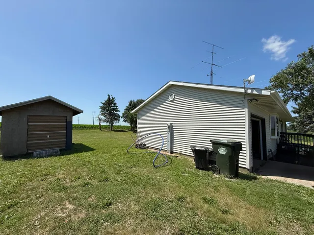 a view of backyard with a garden and entertaining space