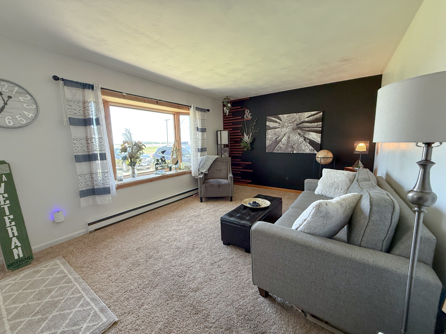 31535 East Thome Road Rock Falls, IL 61071 - Photo 4 of 31 a living room with furniture and a flat screen tv