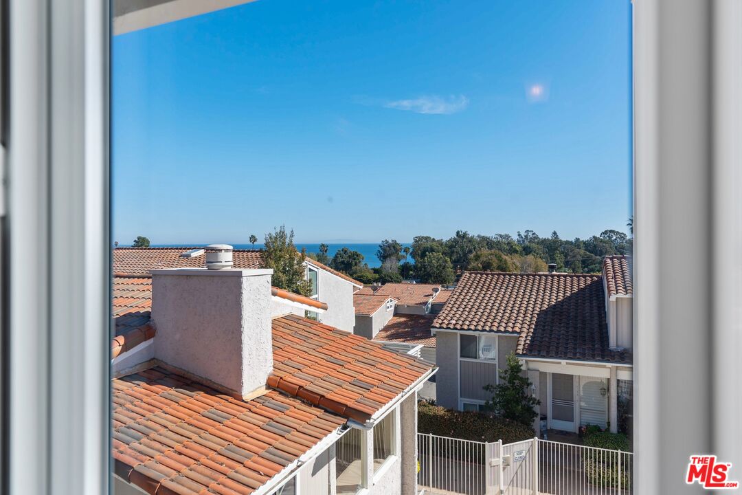 28244 Rey De Copas Lane Malibu, CA 90265 - Photo 19 of 31 a view of a balcony with city