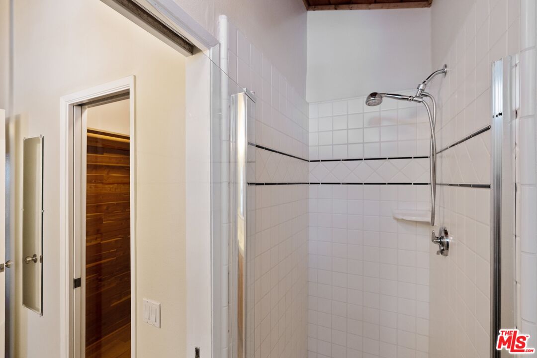 28244 Rey De Copas Lane Malibu, CA 90265 - Photo 23 of 31 a bathroom with a shower