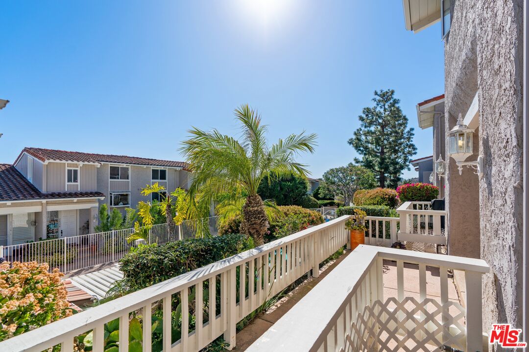 28244 Rey De Copas Lane Malibu, CA 90265 - Photo 27 of 31 a view of a balcony with plants
