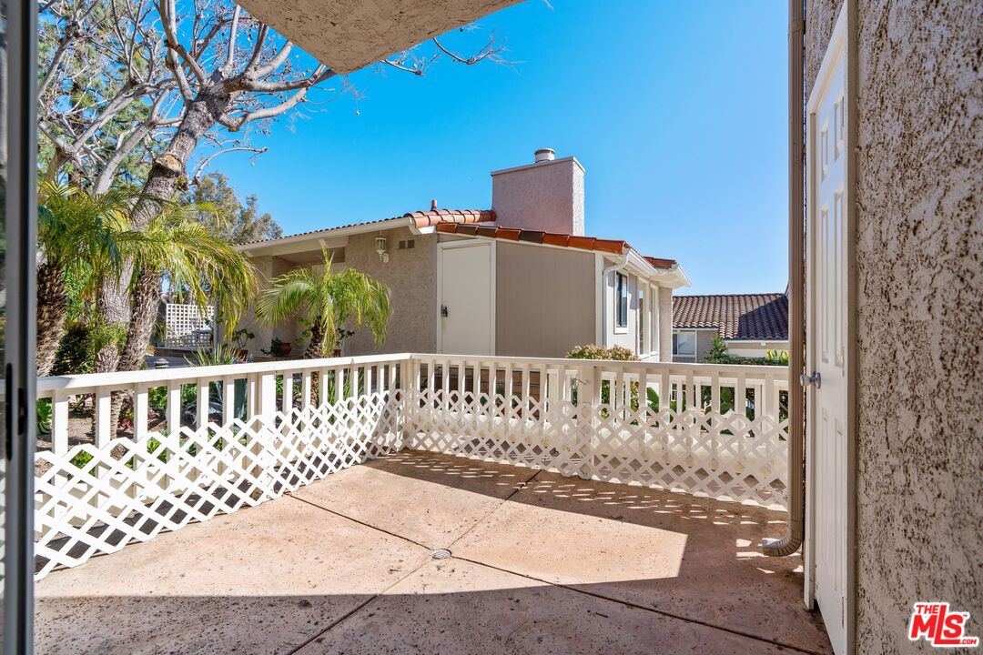 28244 Rey De Copas Lane Malibu, CA 90265 - Photo 5 of 31 a view of a brick building with a large window