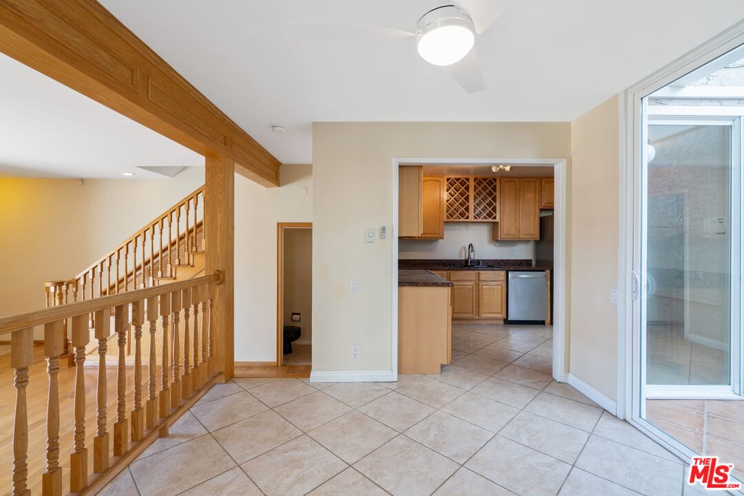 28244 Rey De Copas Lane Malibu, CA 90265 - Photo 8 of 31 a view of a hallway with a kitchen