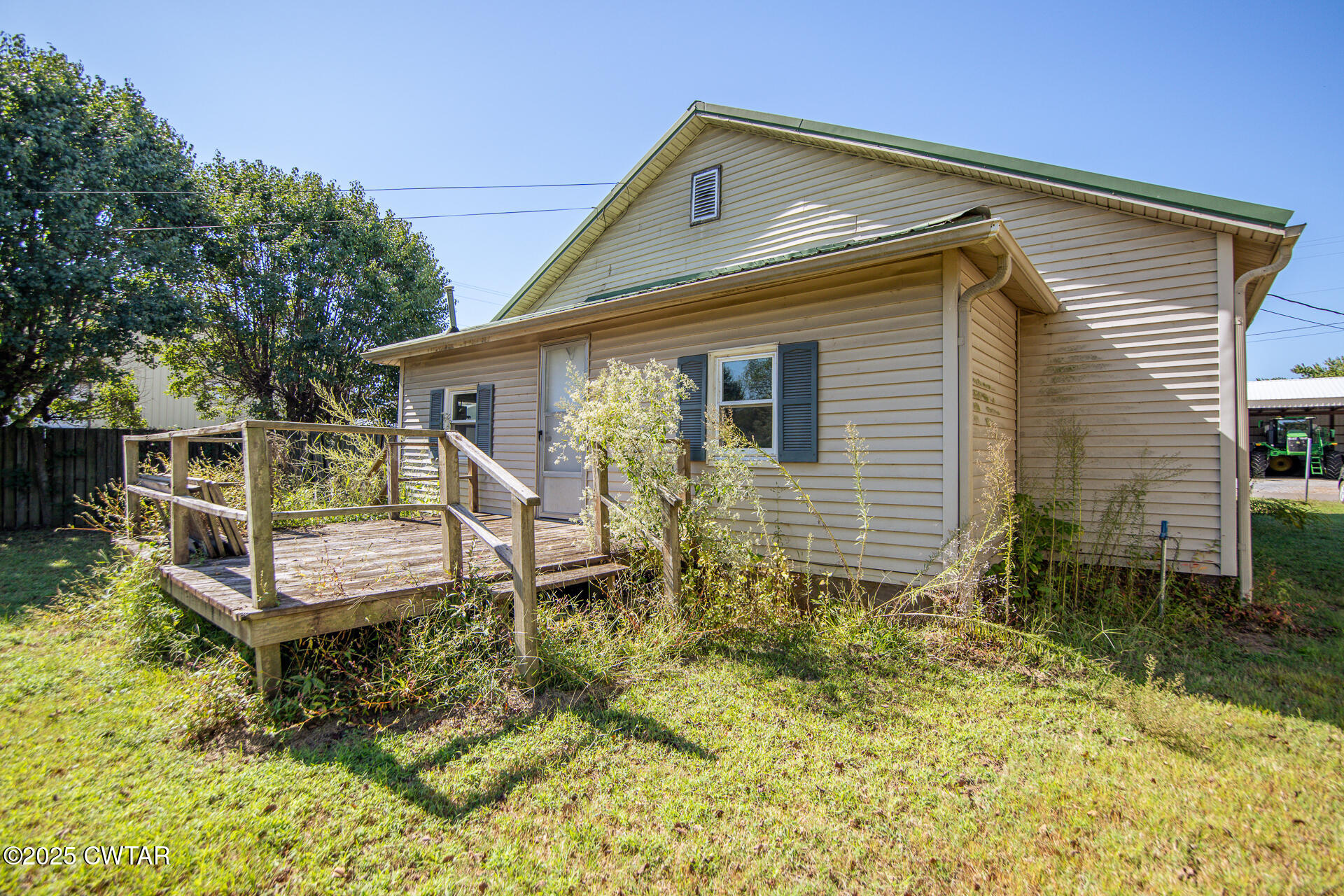 101 North Front Street Kenton, TN 38233 - Photo 23 of 30 a house with trees in the background