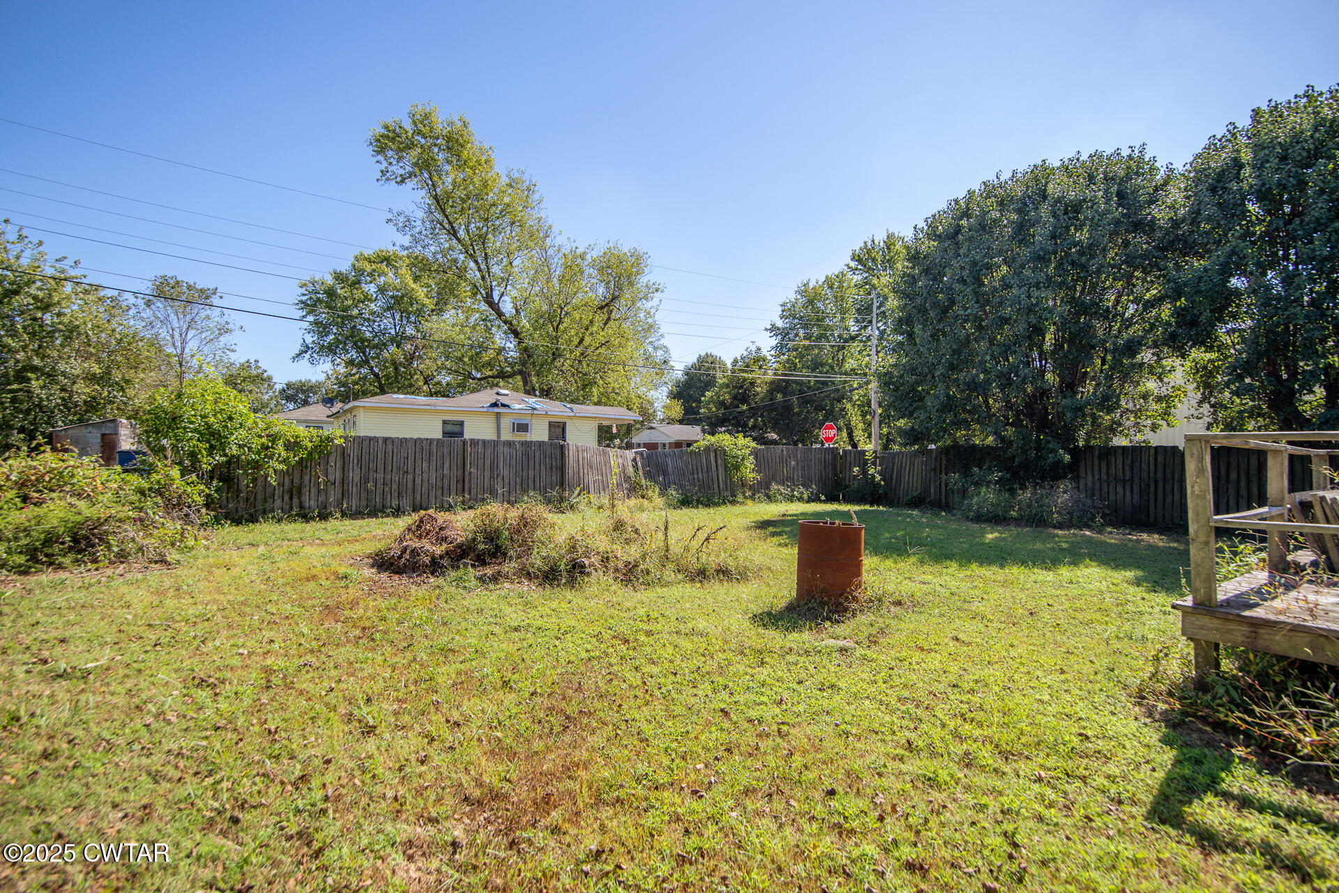 101 North Front Street Kenton, TN 38233 - Photo 24 of 30 a view of a garden with a bench