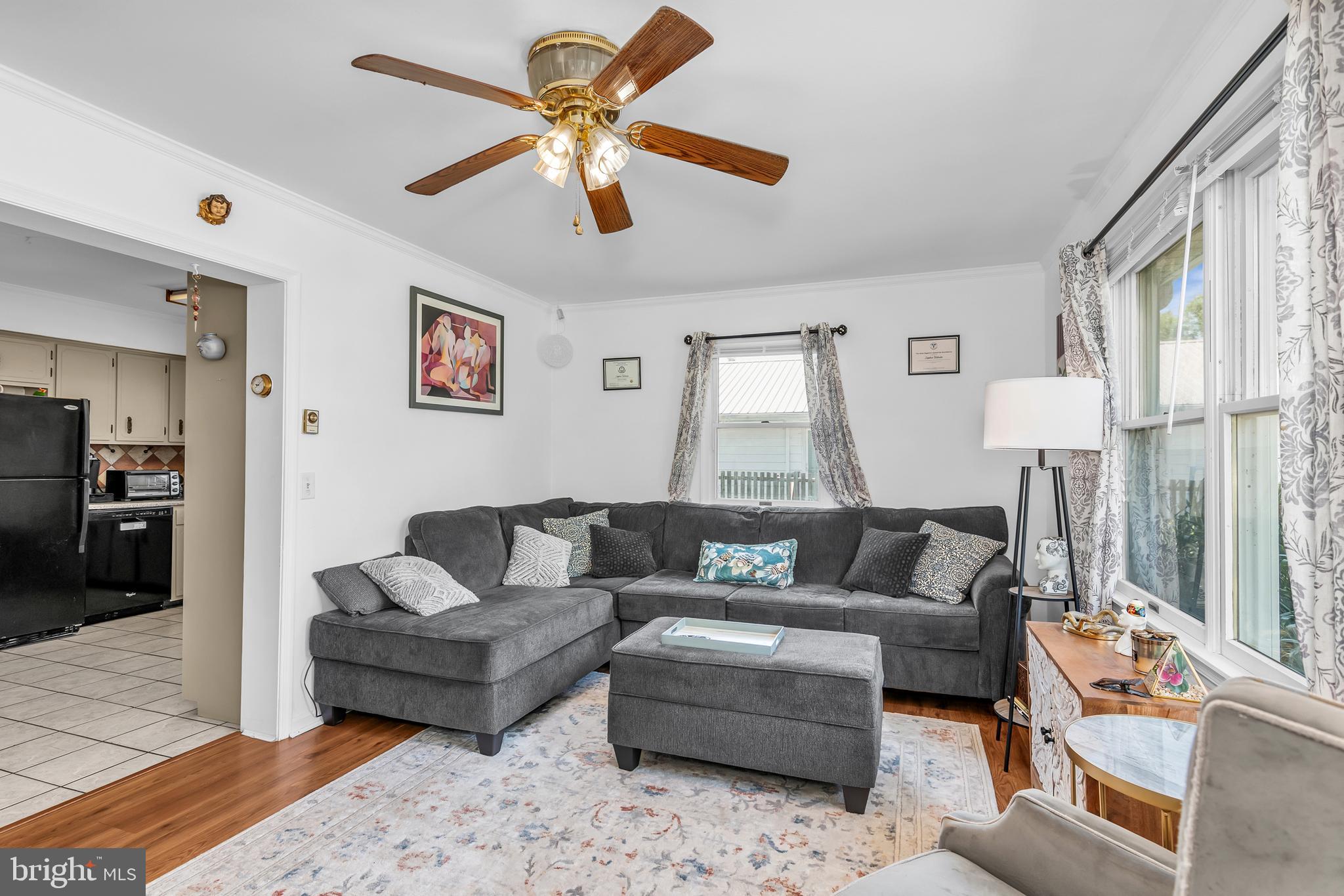 6135 Summit Street Tilghman, MD 21671 - Photo 14 of 31 a living room with furniture and a large window