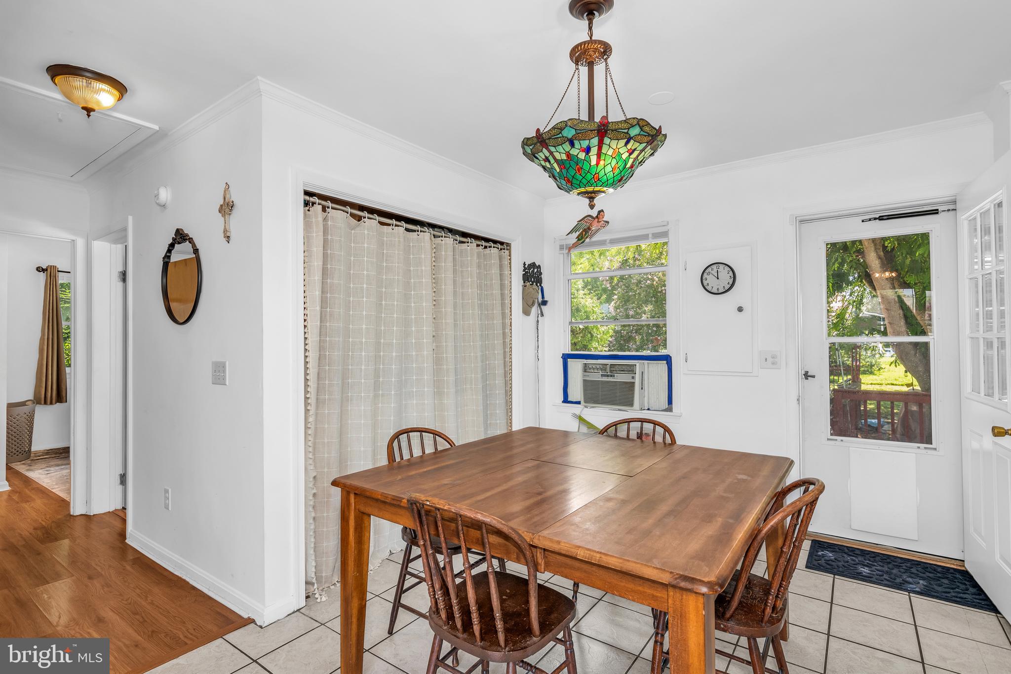 6135 Summit Street Tilghman, MD 21671 - Photo 15 of 31 a view of a dining room with furniture and window