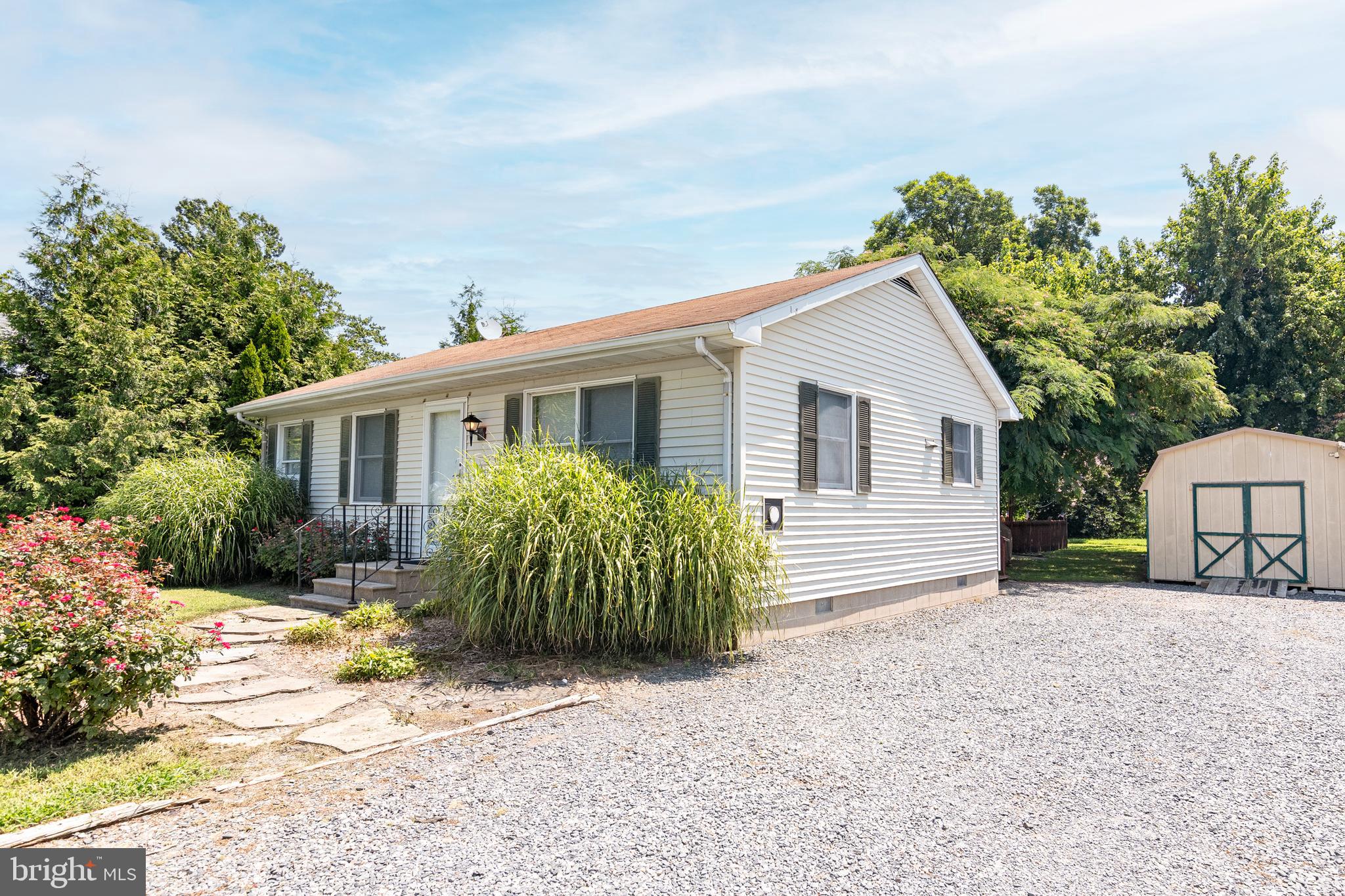 6135 Summit Street Tilghman, MD 21671 - Photo 20 of 31 a view of a house with a patio