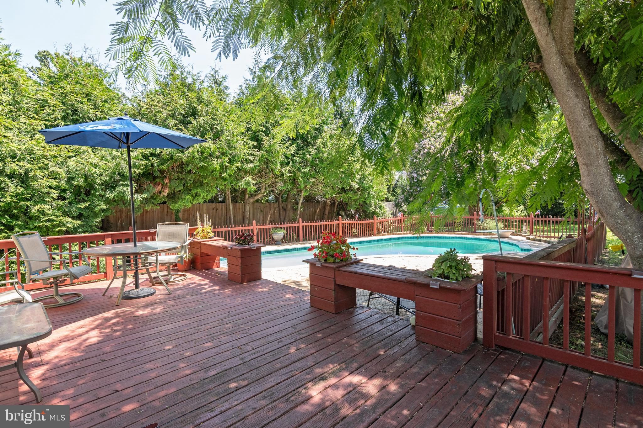 6135 Summit Street Tilghman, MD 21671 - Photo 22 of 31 a view of a chairs and table on the wooden floor