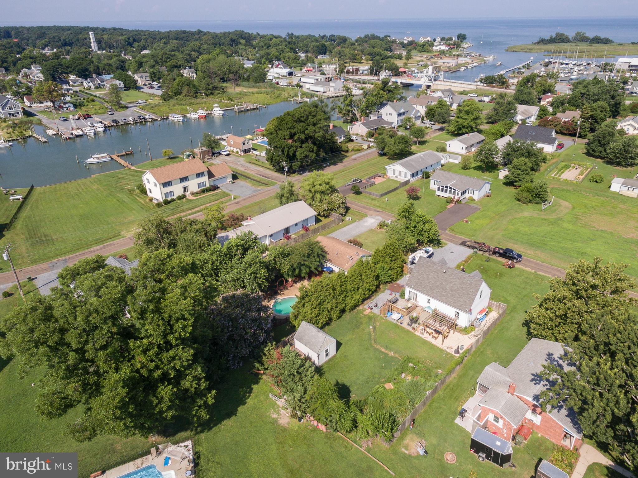 6135 Summit Street Tilghman, MD 21671 - Photo 6 of 31 an aerial view of residential houses with outdoor space