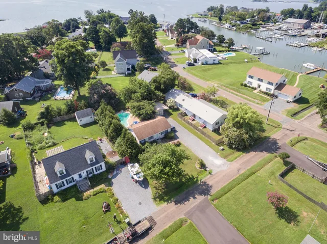 an aerial view of a house with a garden