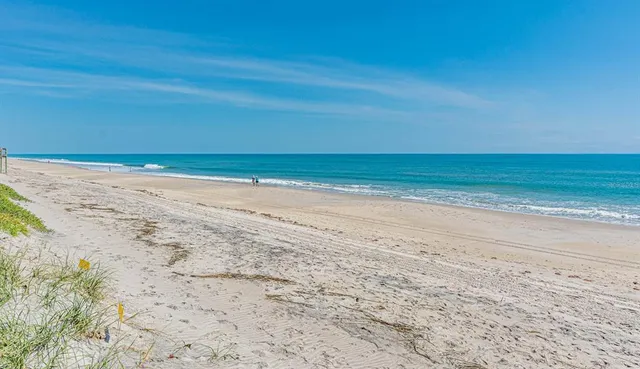 a view of beach and ocean