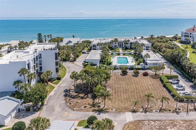 an aerial view of a building with outdoor space