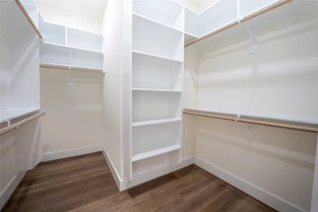 a view of an empty walk in closet