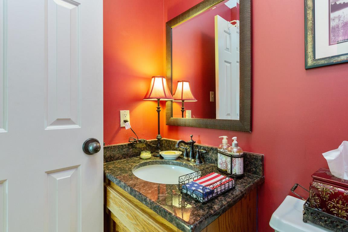 2120 Cairo Bend Road Lebanon, TN 37087 - Photo 14 of 30 a bathroom with a sink and a mirror
