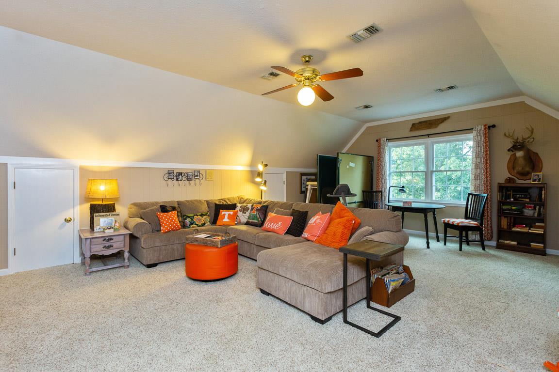 2120 Cairo Bend Road Lebanon, TN 37087 - Photo 15 of 30 a living room with furniture a window and a flat screen tv