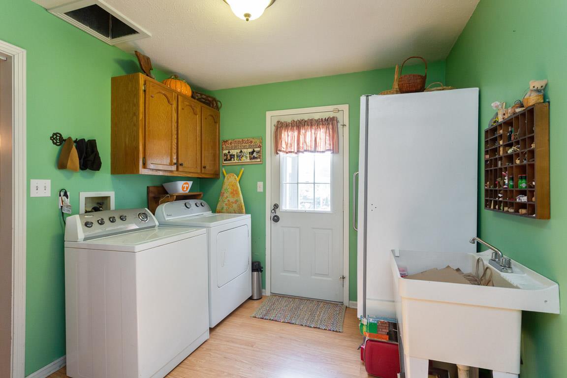 2120 Cairo Bend Road Lebanon, TN 37087 - Photo 24 of 30 a utility room with dryer and washer