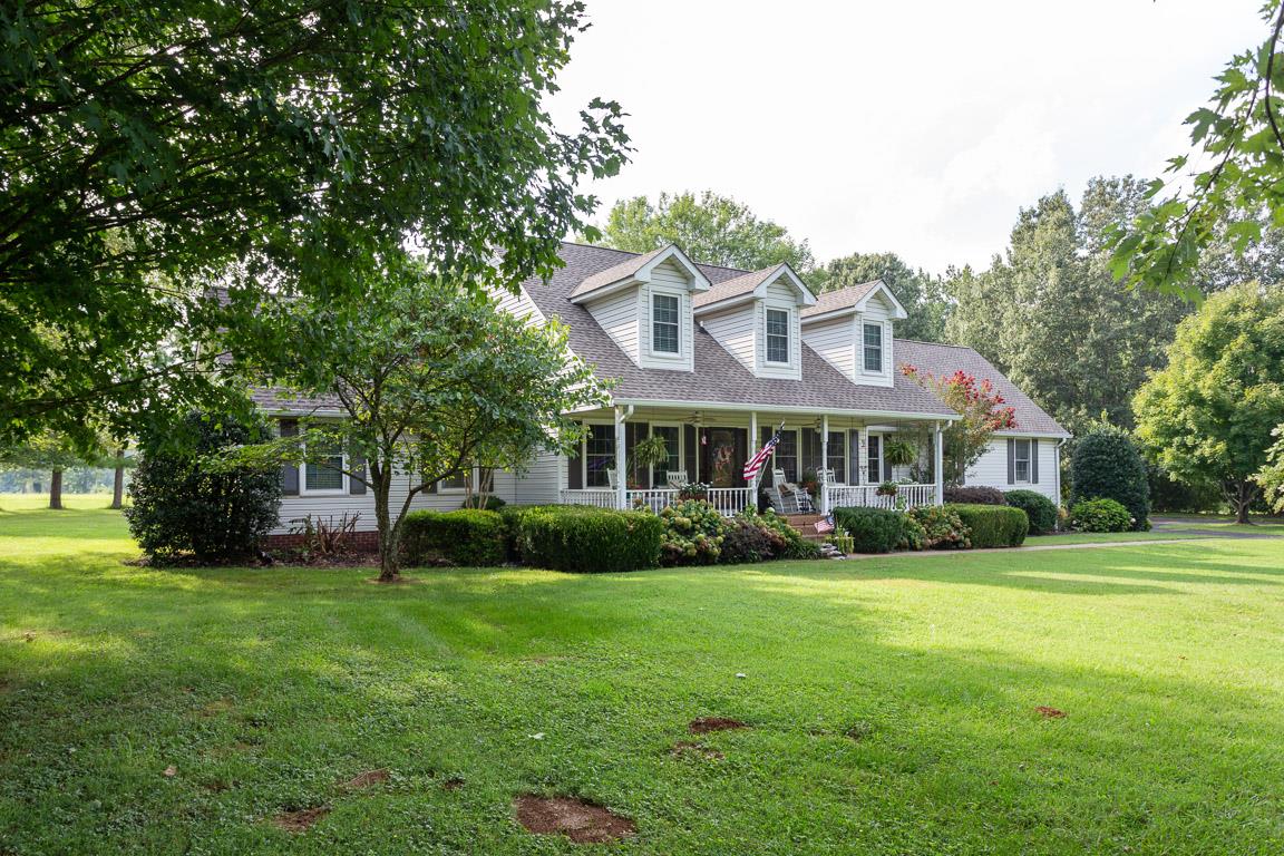 2120 Cairo Bend Road Lebanon, TN 37087 - Photo 26 of 30 a view of a big house with a big yard and large trees