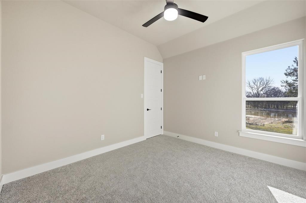 1053 Llano Way Poolville, TX 76487 - Photo 35 of 40 an empty room with a window