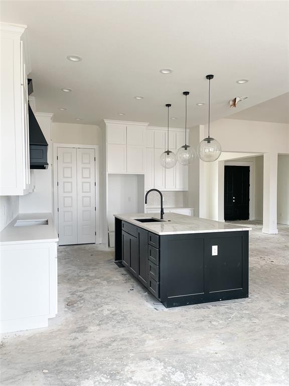 4072 County Road Cleburne, TX 76031 - Photo 11 of 20 a large kitchen with stainless steel appliances granite countertop a large counter top and a stove
