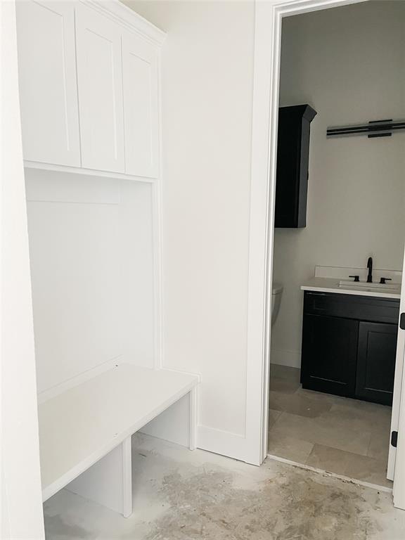 4072 County Road Cleburne, TX 76031 - Photo 13 of 20 a view of cabinet with mirror