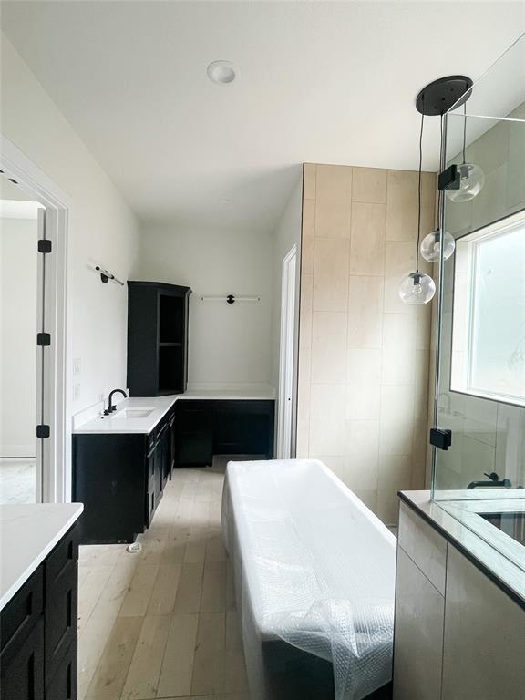 4072 County Road Cleburne, TX 76031 - Photo 18 of 20 a living room with a sink furniture and a chandelier