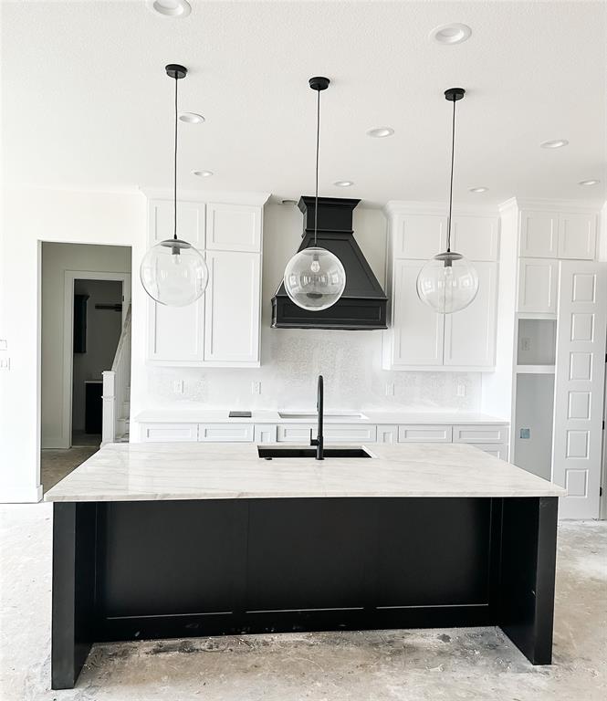4072 County Road Cleburne, TX 76031 - Photo 3 of 20 a view of kitchen with a sink a clock and cabinets