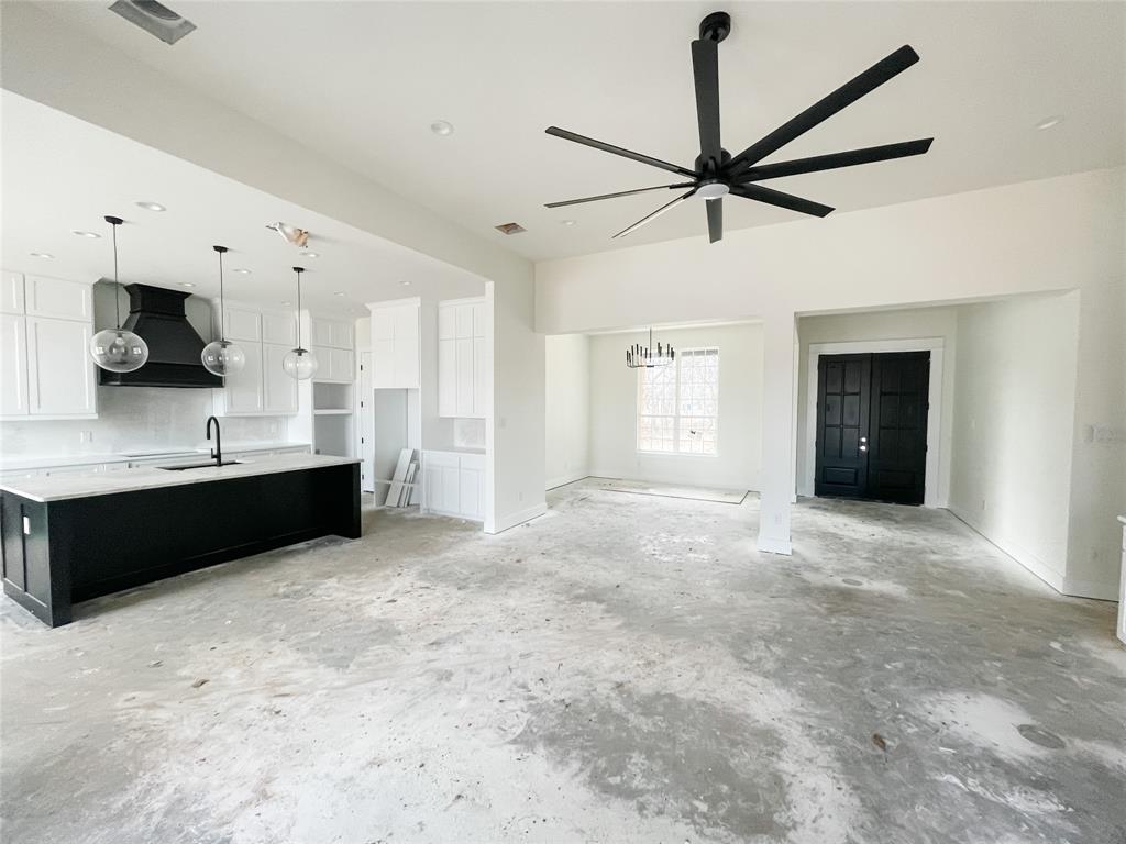 4072 County Road Cleburne, TX 76031 - Photo 9 of 20 a view of a kitchen with a sink and a window