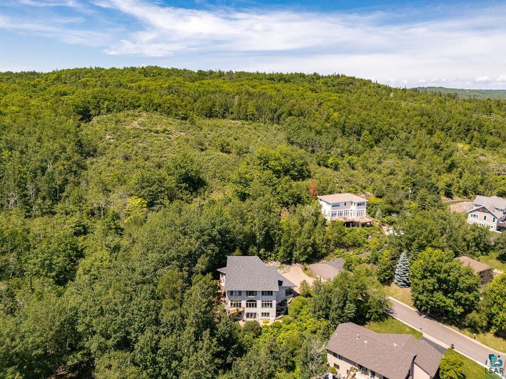 4856 Kingston Street Duluth, MN 55804 - Photo 83 of 88 Aerial perspective showcasing a residential area nestled within a verdant, hilly landscape