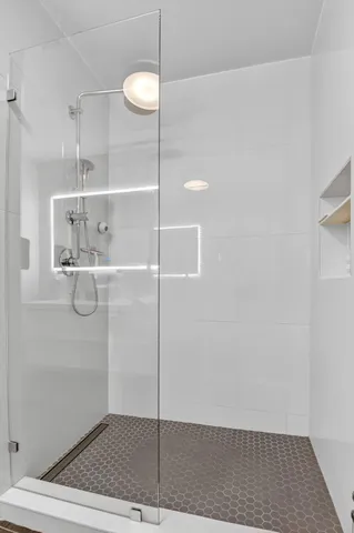 a view of entryway with wooden floor