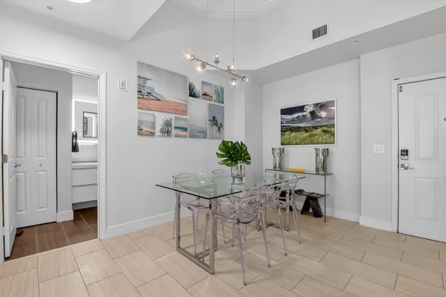 a view of kitchen and dining area with furniture