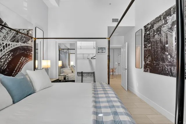 a view of the house with backyard and sitting area