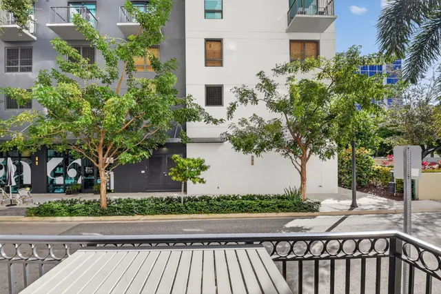 a large building with a city view