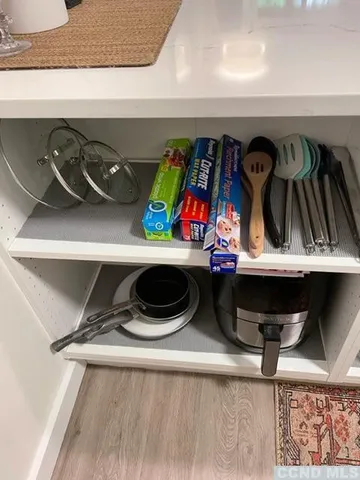 a view of a refrigerator in a kitchen