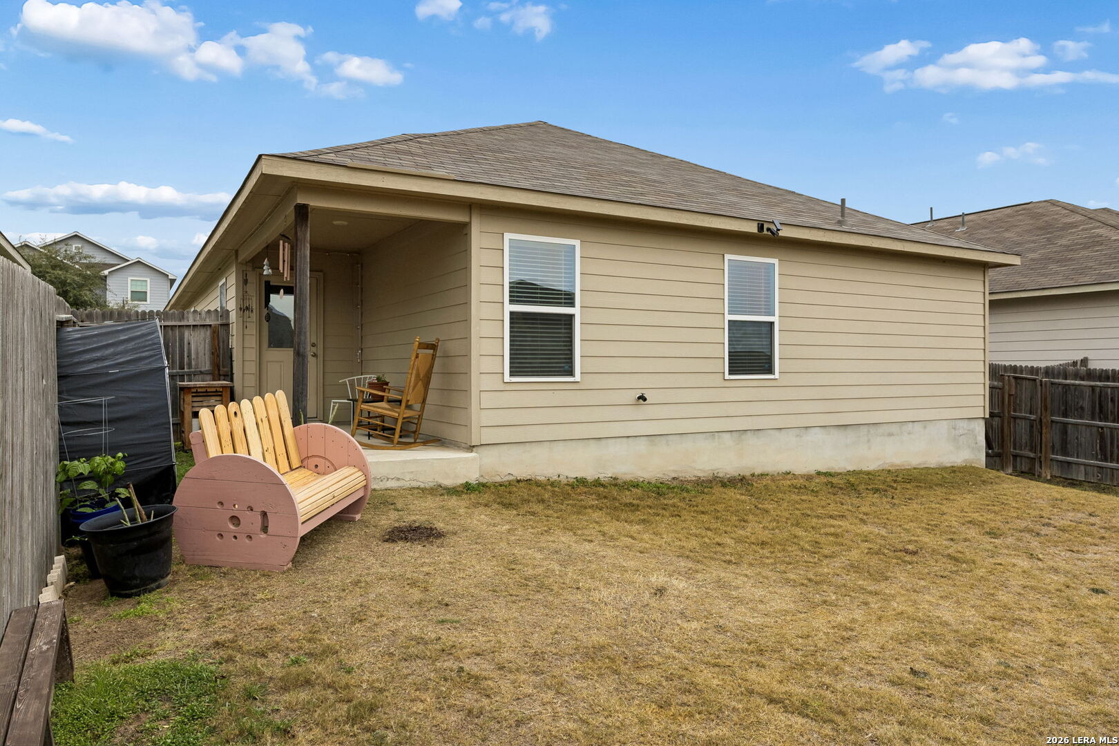 2026 Rhesus View San Antonio, TX 78245 - Photo 29 of 39 a view of backyard of the house