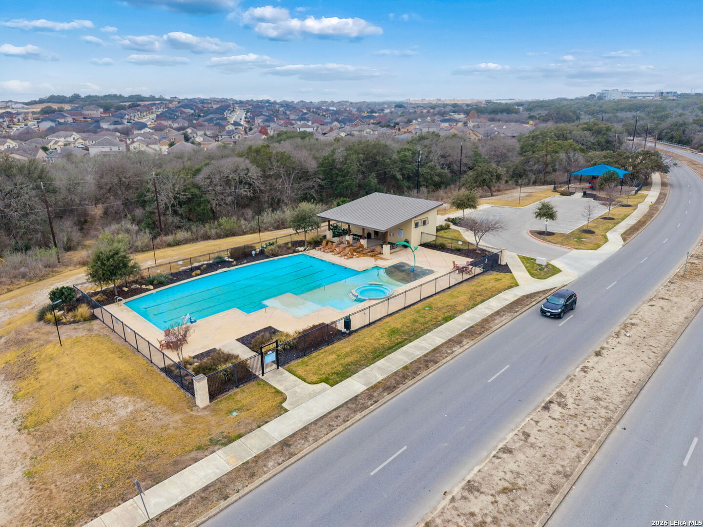 2026 Rhesus View San Antonio, TX 78245 - Photo 36 of 39 a view of a balcony with furniture