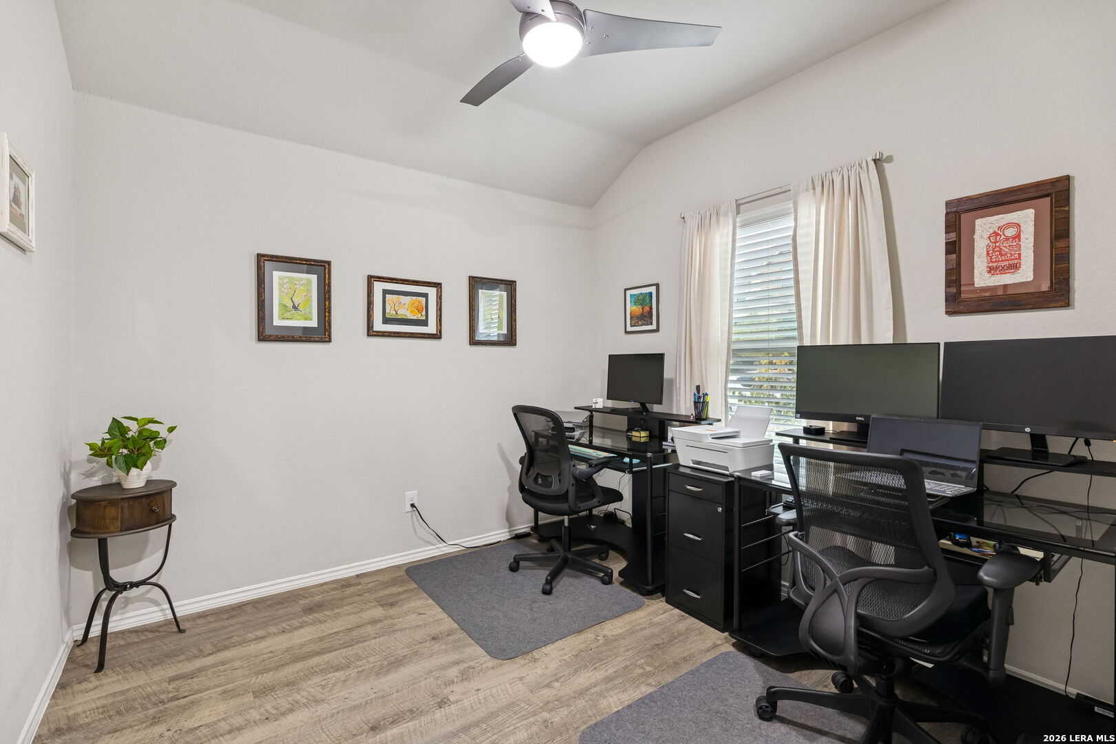 2026 Rhesus View San Antonio, TX 78245 - Photo 6 of 39 a view of a workspace with furniture and a window