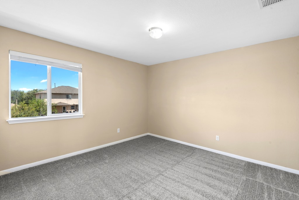 458 Nottingham Loop Kyle, TX 78640 - Photo 28 of 38 an empty room with a window