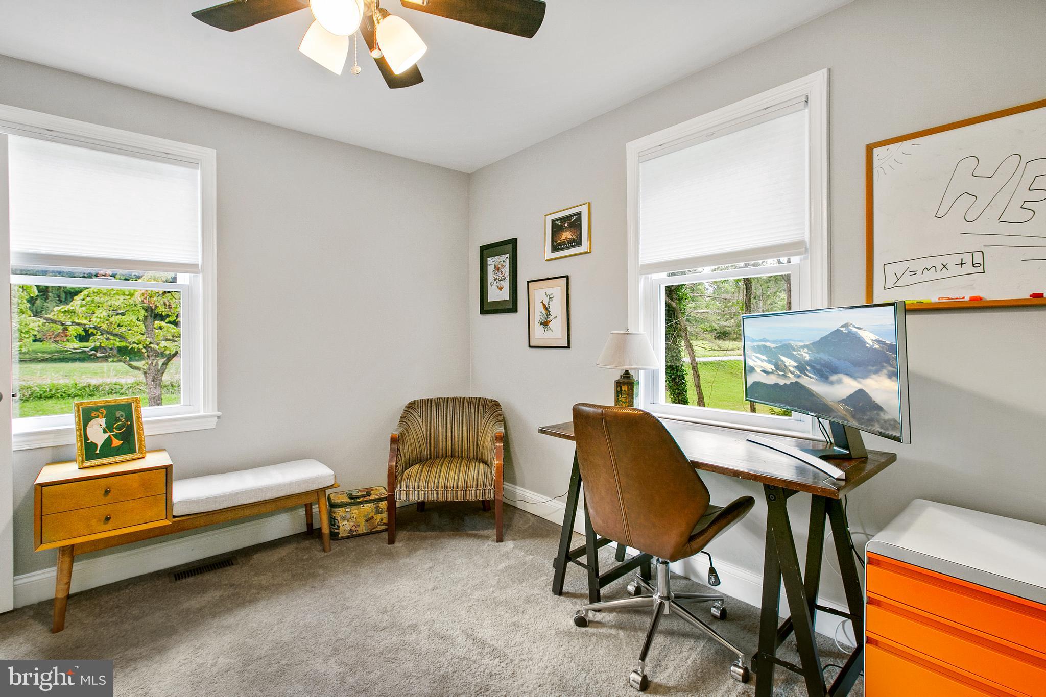 2930 Ridge Road Baltimore, MD 21244 - Photo 17 of 39 a livingroom with workspace and a window