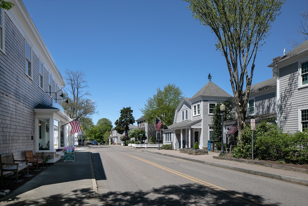 31 Main Street Marion, MA 02738 - Photo 26 of 29 a view of a town with brick building and large trees