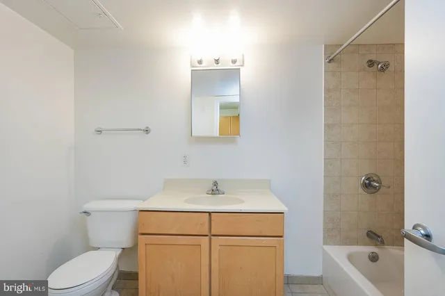 a bathroom with a sink and a bathtub