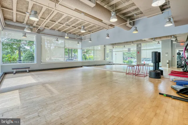 a view of a swimming pool with a lounge chairs