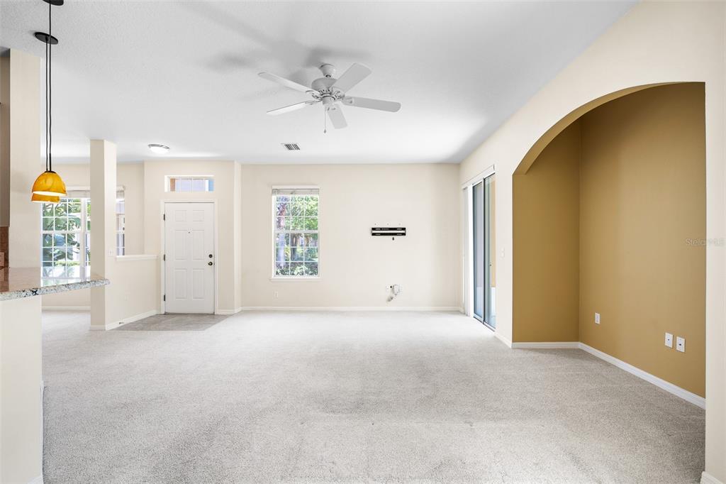 7001 Interbay Boulevard, Unit 303 Tampa, FL 33616 - Photo 14 of 37 an empty room with windows and entrance