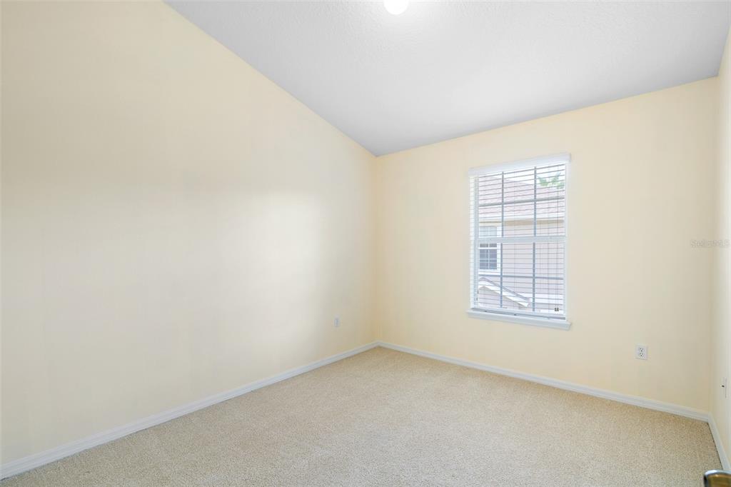 7001 Interbay Boulevard, Unit 303 Tampa, FL 33616 - Photo 21 of 37 an empty room with windows