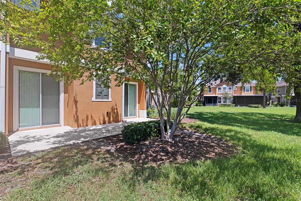 7001 Interbay Boulevard, Unit 303 Tampa, FL 33616 - Photo 26 of 37 a front view of a house with garden